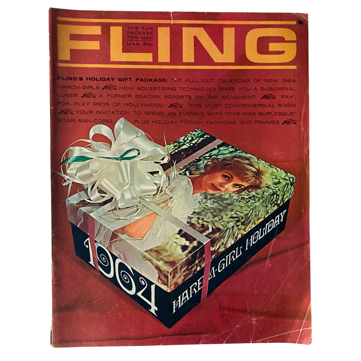 Cover of Fling Magazine March 1964, featuring 'Harem Girl Holiday 1964'. The cover displays a festive design with a present featuring a beautiful woman on the front, complete with a large ribbon and colorful graphics.