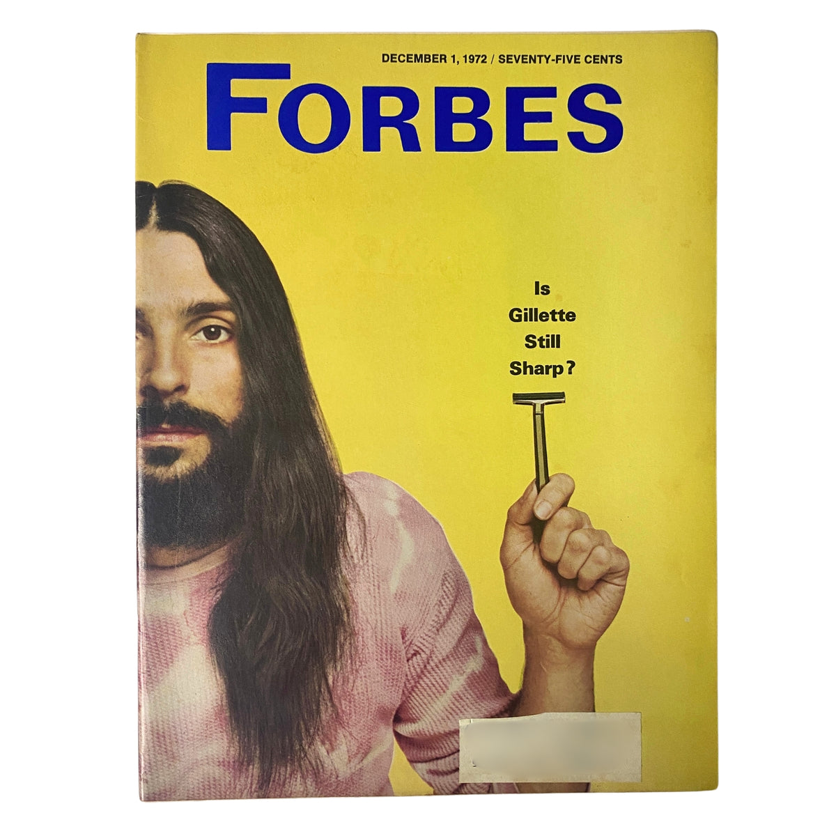 Forbes Magazine cover from December 1, 1972, featuring a man with long hair holding a razor, with the headline 'Is Gillette Still Sharp?' This vintage issue explores the corporate challenges faced by Gillette.