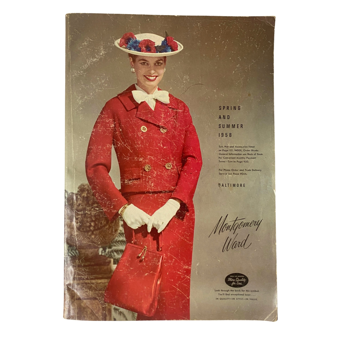 Cover of the 1958 Montgomery Ward Spring and Summer Catalog featuring a woman in a stylish red outfit with a white hat and handbag.