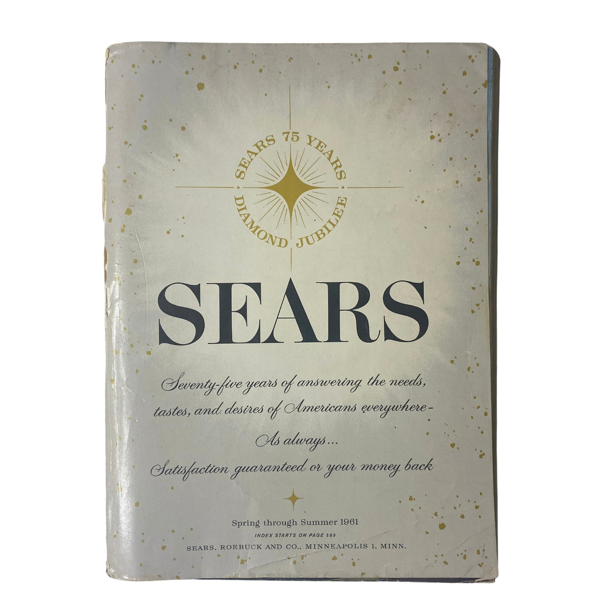 Cover of the 1961 Sears Roebuck and Co. Spring and Summer Catalog, celebrating 75 years of quality service with a stylish design featuring the Sears logo and text about customer satisfaction.