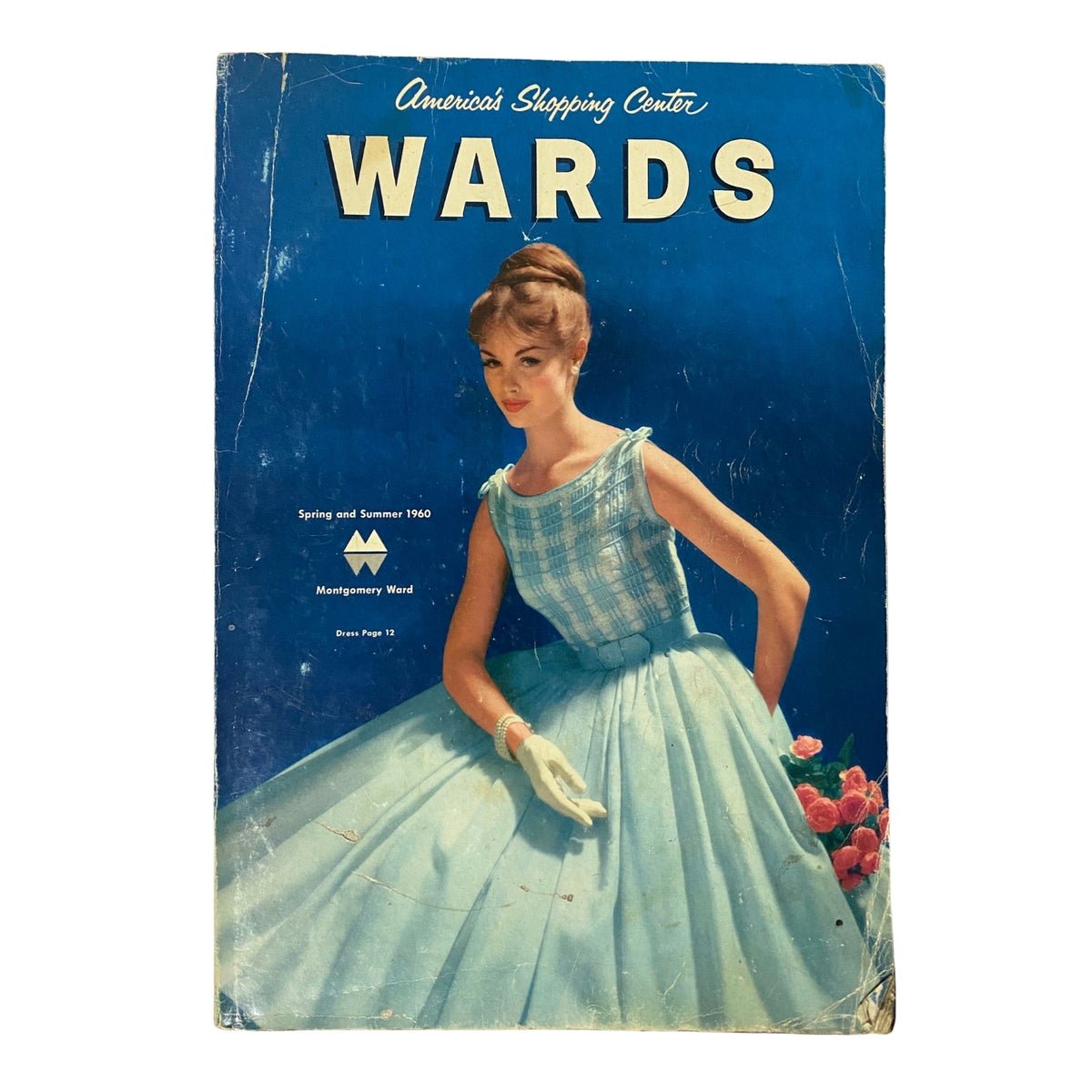 1960 Montgomery Ward 'Wards' Spring and Summer Catalog cover featuring a stylish model in a blue dress, showcasing mid-century fashion trends.