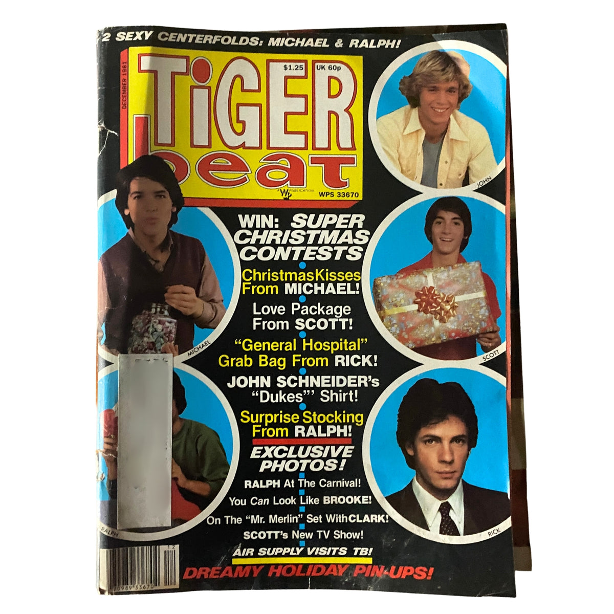 Cover of Tiger Beat Magazine December 1981 featuring John Schneider, Scott Baio, and Rick Springfield with Christmas contest promotions and celebrity highlights.