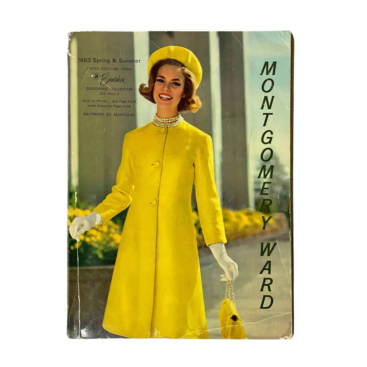 Cover of the 1963 Montgomery Ward Spring and Summer Catalog featuring a woman in a yellow coat and hat, representing mid-century fashion.