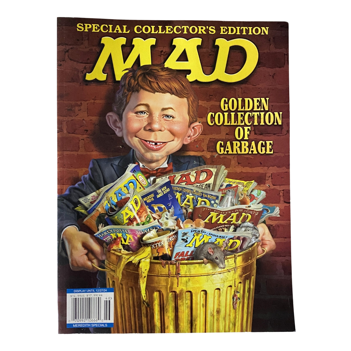 Cover of Mad Magazine 2023 Golden Collection of Garbage Special Collector's Edition featuring a humorous illustration of a character surrounded by vintage MAD magazine issues in a trash can
