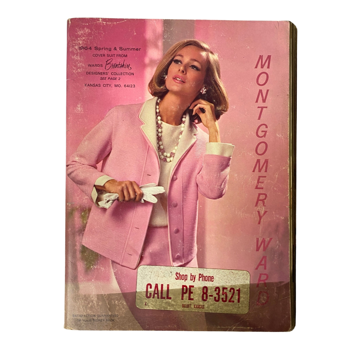 1964 Montgomery Ward Spring and Summer Catalog cover featuring a model in a pink suit with a pearl necklace, showcasing vintage fashion from the 1960s.