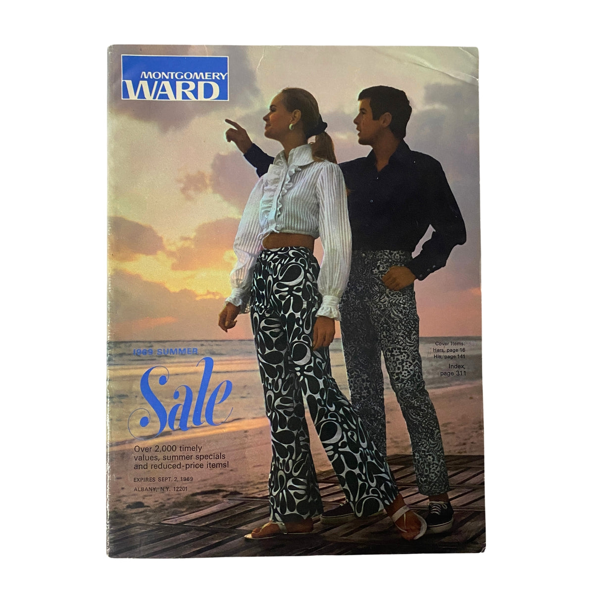 Cover of the 1969 Montgomery Ward Summer Catalog, featuring a couple dressed in vintage summer fashion against a scenic background. The cover highlights bold 1960s swimwear styles and promotional sale details.