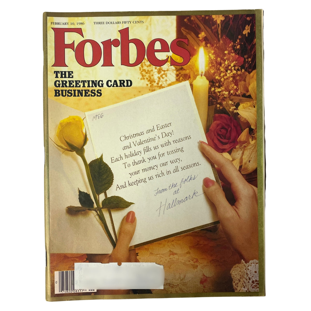 Cover of Forbes Magazine February 10, 1986 featuring the article 'The Greeting Card Business'. The cover displays a woman holding a greeting card with a yellow rose, highlighting themes of sentiment and emotion.
