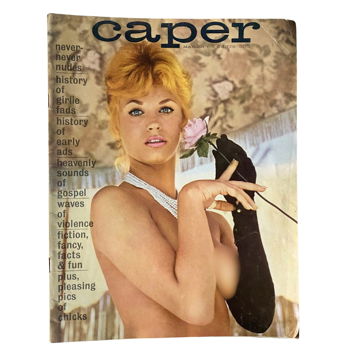 Caper Magazine March 1964, Volume 10, No. 2 cover featuring a blonde model holding a rose and wearing a pearl necklace and black glove, highlighting the theme 'Never-Never Nudes' and the history of girlie fads.