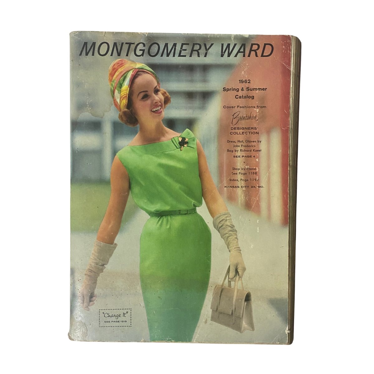 1962 Montgomery Ward Spring and Summer Catalog cover featuring a model in a vibrant green dress and stylish accessories, showcasing mid-20th century fashion trends.