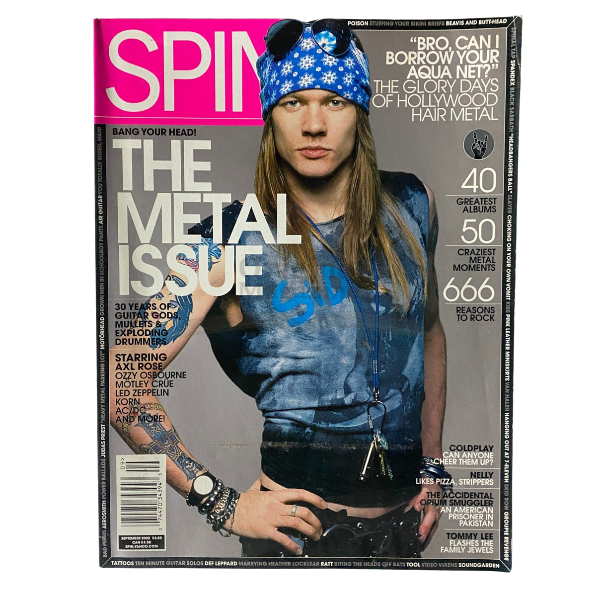 Spin Magazine September 2002 Axl Rose cover, featuring the Metal Issue with a blue bandana and casual rock attire, showcasing the essence of early 2000s metal culture.