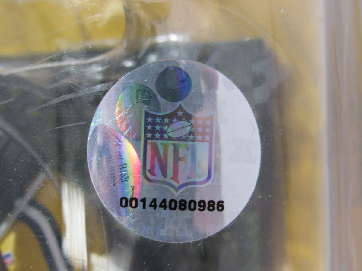 Close-up of the NFL holographic sticker on the McFarlane NFL Reggie White Green Bay Packers Action Figure packaging, ensuring authenticity.
