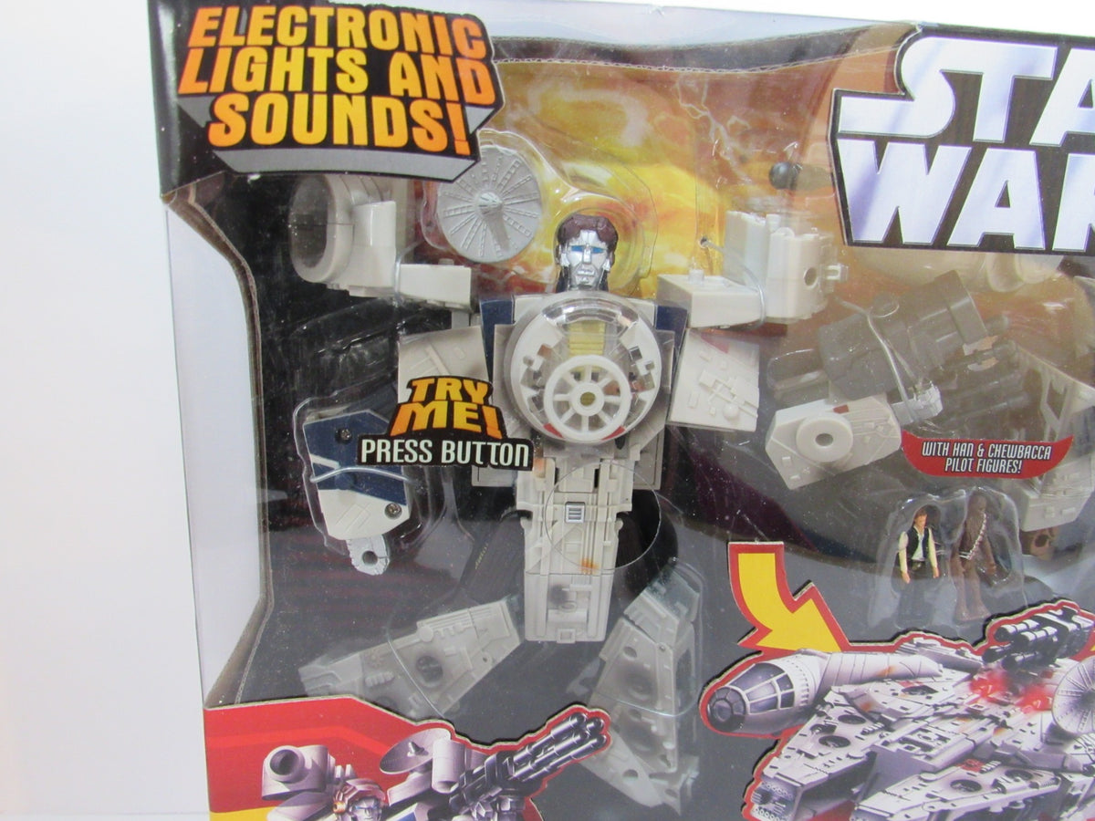 Close-up of the Star Wars Deluxe Transformer Han Solo figure, showcasing the interactive features and press button for electronic sounds.