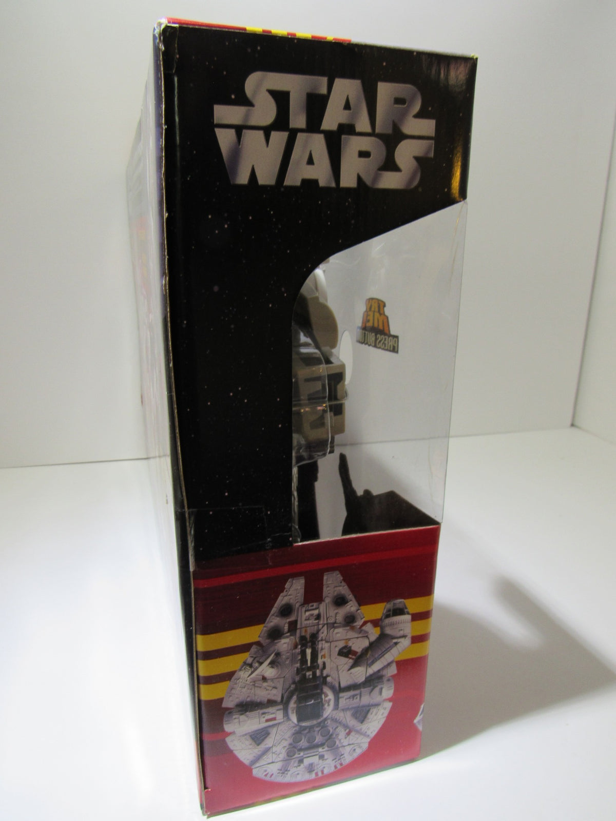 Side profile of the Star Wars Deluxe Transformer Han Solo and Chewbacca - Millennium Falcon box emphasizing its packaging and display features.