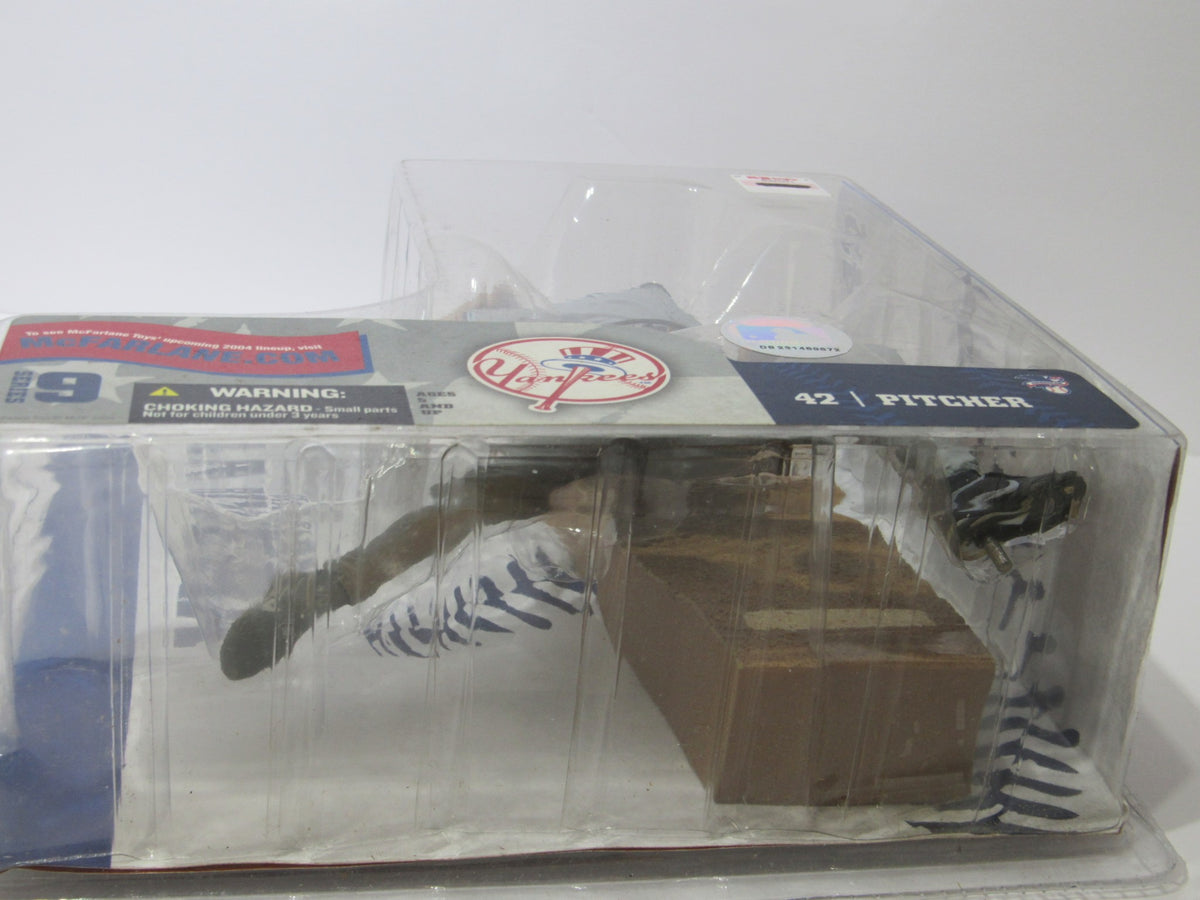 Mcfarlane MLB Series 9 Figure: Mariano Rivera with Gray Yankees Jersey displayed in its original packaging, highlighting the collectible's branding.