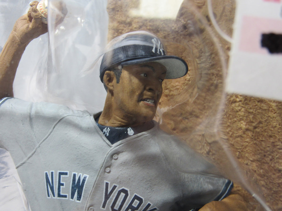 Close-up view of the Mcfarlane MLB Series 9 Figure: Mariano Rivera in Gray Yankees Jersey, capturing the facial expression and pose of the pitcher.