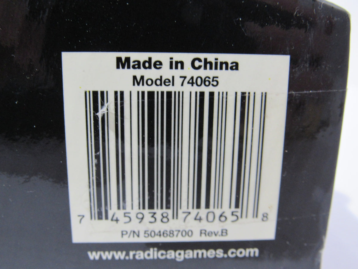 Close-up of the barcode label on the Sega Genesis Radica Plug and Play 6 Games-In-One packaging, indicating the model number 74065.