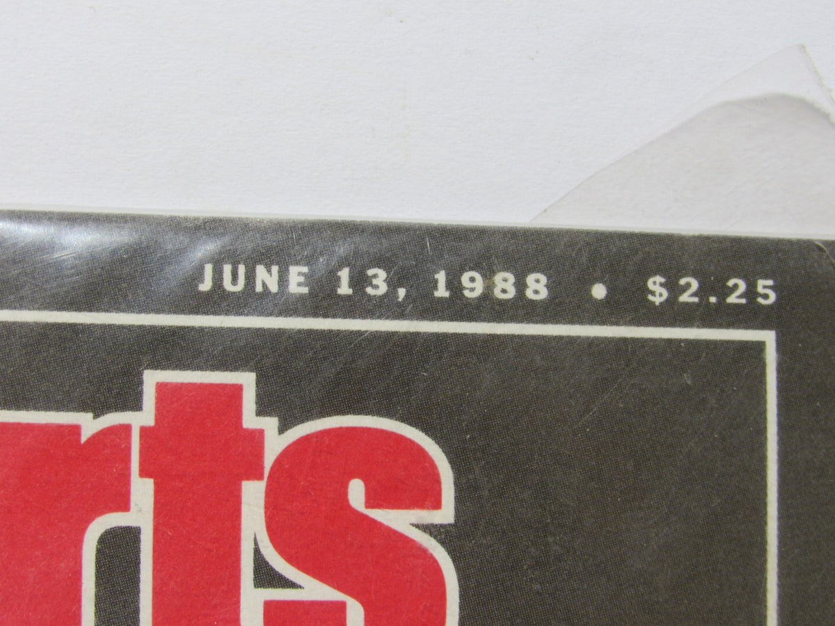 Detail shot of the publication date and price on the top of Sports Illustrated, June 13, 1988; the magazine features Mike Tyson and Robin Givens on the cover.