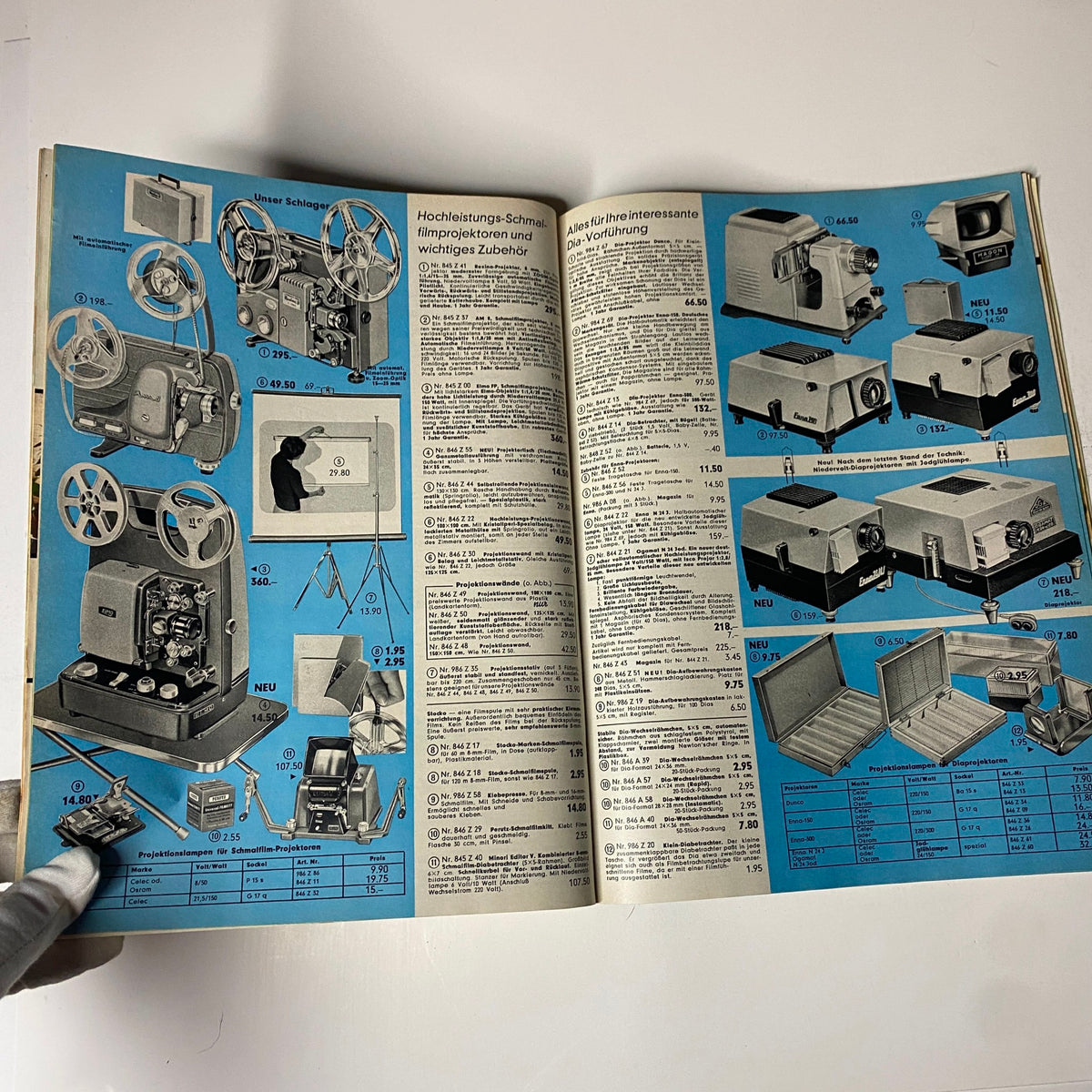 1965 Neckermann Summer Catalog page featuring film projectors and accessories, with detailed pricing and product illustrations.
