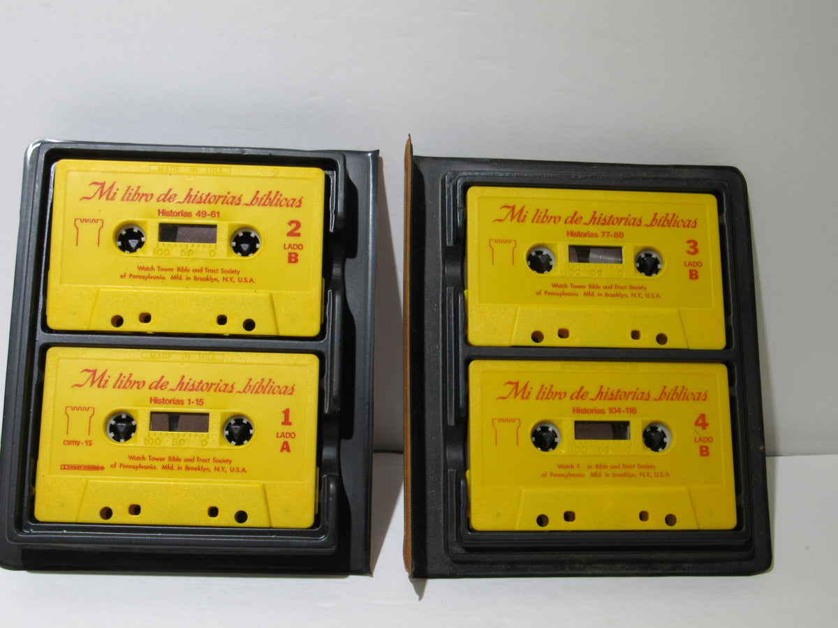 Four cassettes from '1970s Mi Libro de Historias Biblicas My Book of Bible Stories,' labeled in Spanish with stories and titles.