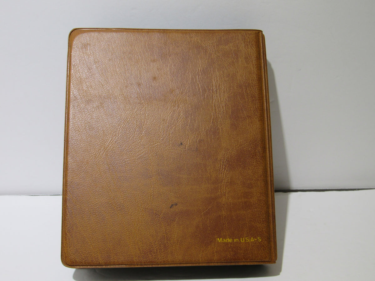 Cover of the vintage 1970s Mi Libro de Historias Biblicas My Book of Bible Stories, showing a brown leatherette exterior with the text 'Made in U.S.A. S' embossed.