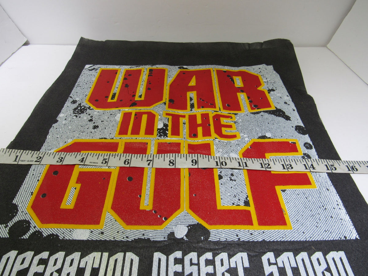 Vintage 90's War in The Gulf: Operation Desert Storm banner displayed with a measuring tape for size reference, showcasing vivid colors and bold text on a textured background.