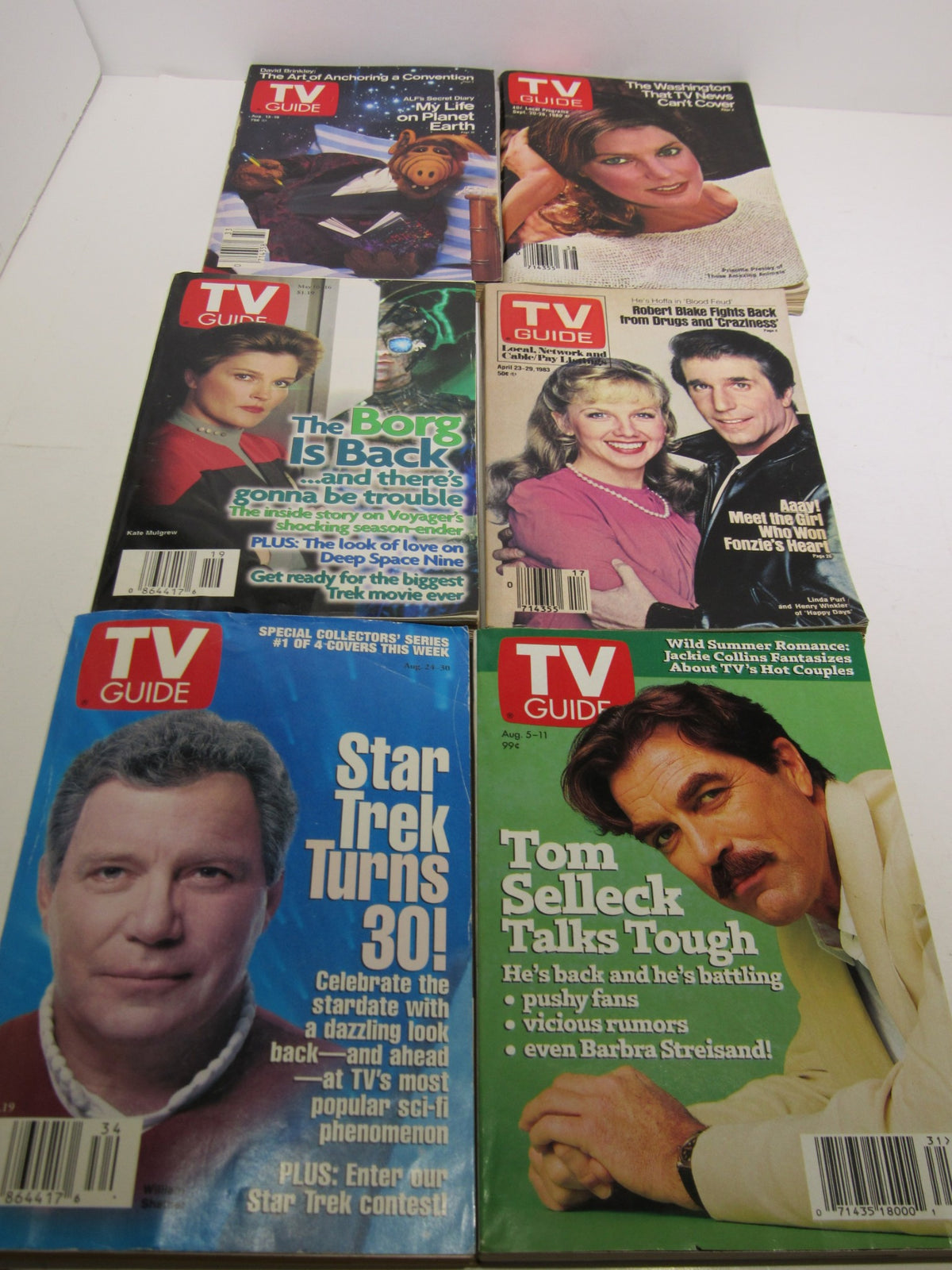 Lot of 20 TV Guide Magazines including featured covers, in excellent condition with pages intact, showcasing popular shows and actors from different eras.