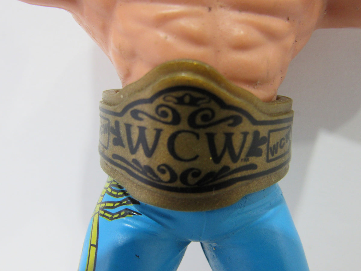 Close-up view of the 1990 WCW Galoob Sting with Belt Action Figure displaying the championship belt and intricate details of the figure.