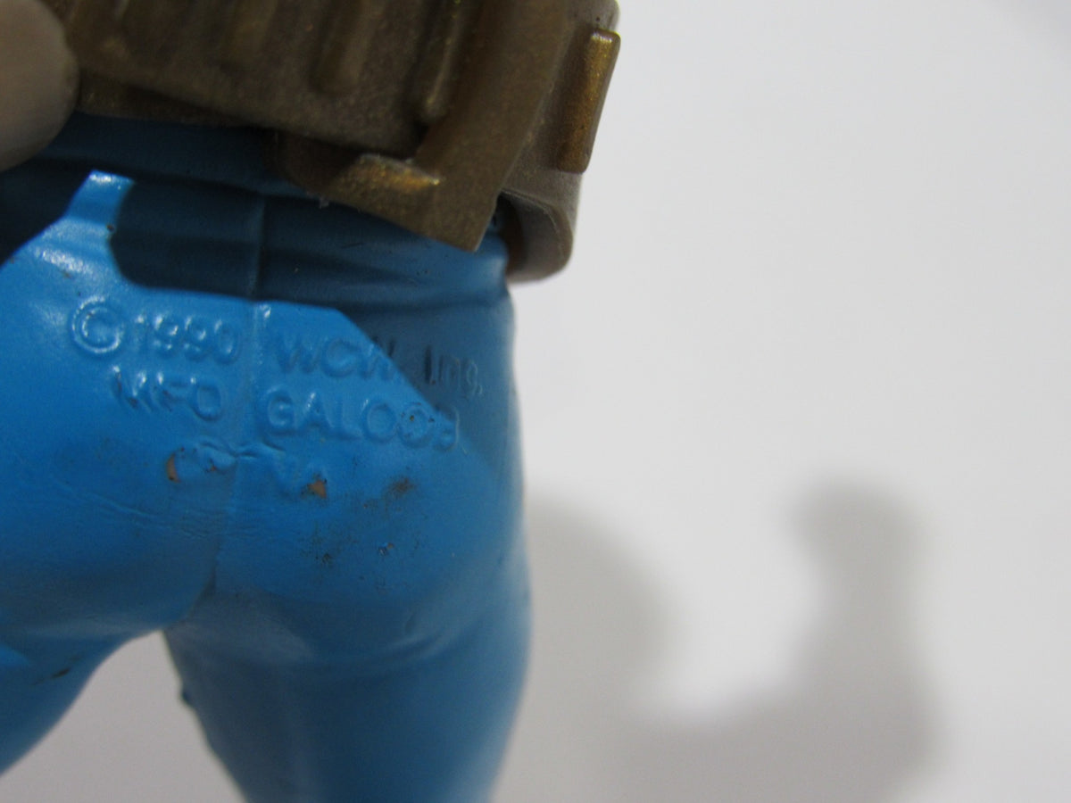 Close-up of the back of the 1990 WCW Galoob Sting with Belt Action Figure showing manufacturing details.