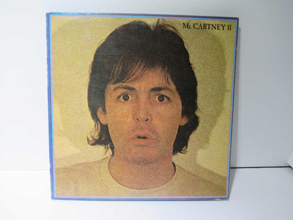 1980 Paul McCartney: McCartney II LP album cover featuring Paul McCartney with expressive face and brown hair. Record Grade: VG.