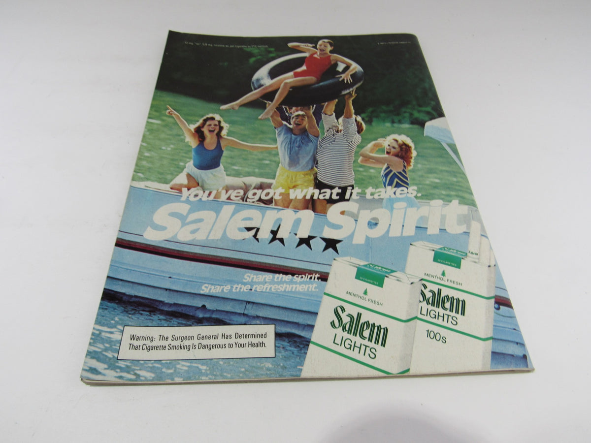 Vintage Salem cigarette advertisement from the 1960s featuring a group of friends enjoying a day on the water, promoting the sharing spirit of Salem Lights.