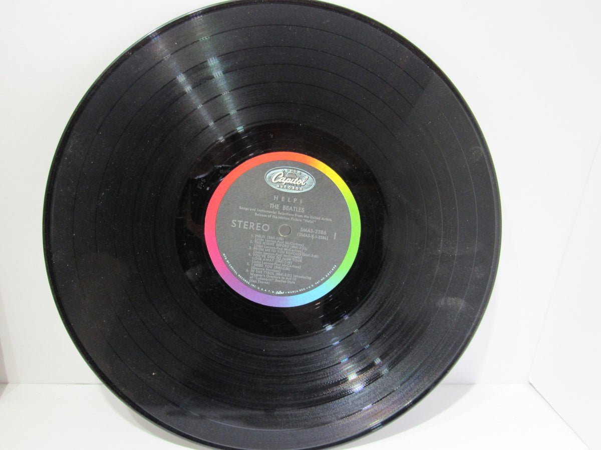 Another angle of The Beatles Help! OMPS/OST Capitol Gatefold Stereo LP SMAS 2386 emphasizing the label side of the vinyl record.