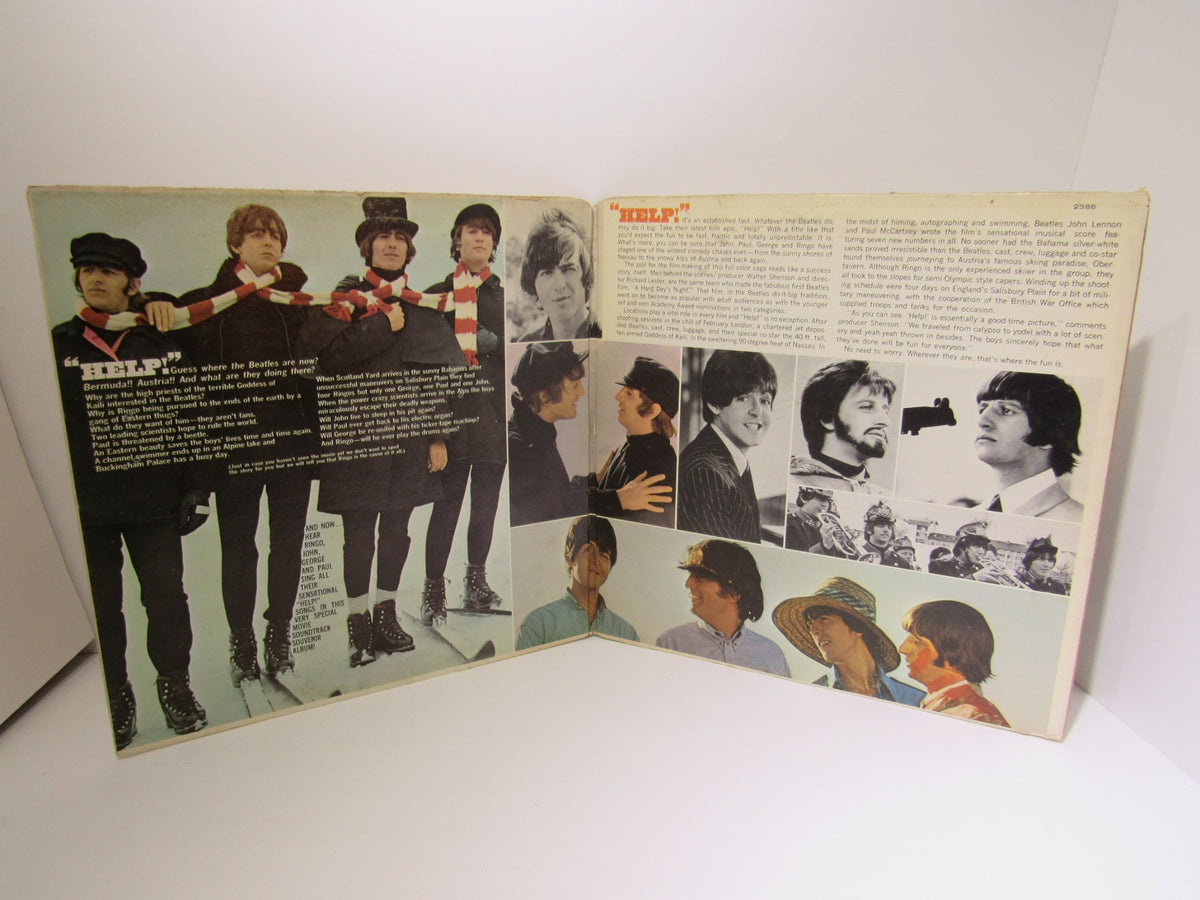 Interior spread of The Beatles ‎– Help! OMPS/OST Gatefold LP showcasing band photos and information about the film.