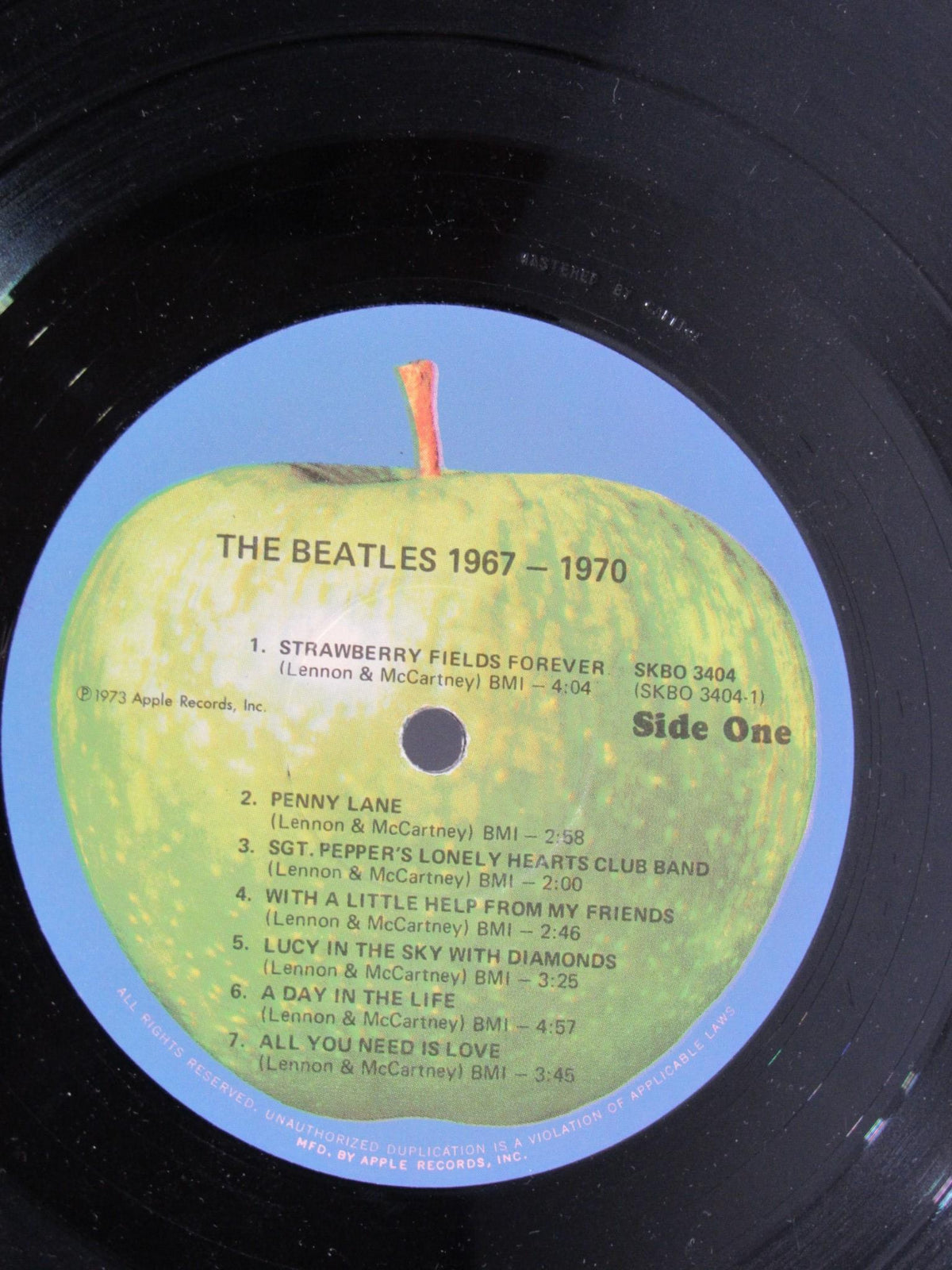 The Beatles 1967-1970 Gatefold Sleeve Vinyl Record label - Side One with song titles.