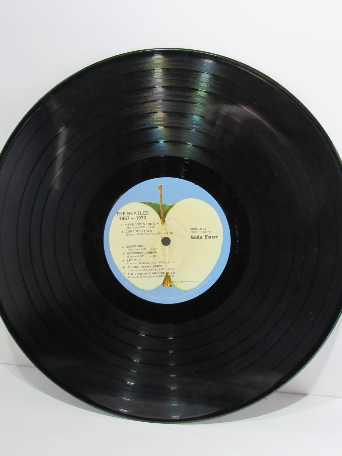 The Beatles 1967-1970 Gatefold Sleeve Vinyl Record - Side Four highlighting the tracklist.
