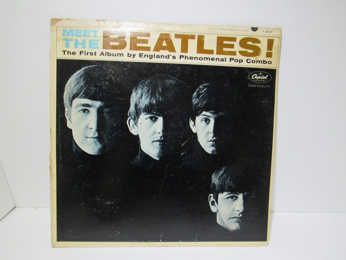 Front cover of The Beatles: Meet The Beatles US Mono Capitol Records LP T 2047 featuring the iconic band portrait.