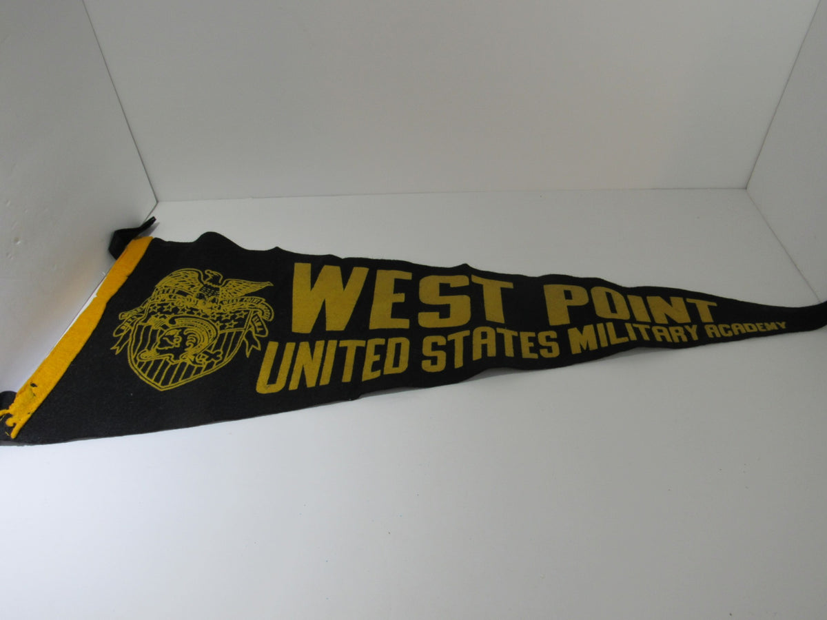 Vintage West Point United States Military Pennant Banner featuring bold yellow lettering and eagle insignia, perfect for collectors of military memorabilia.