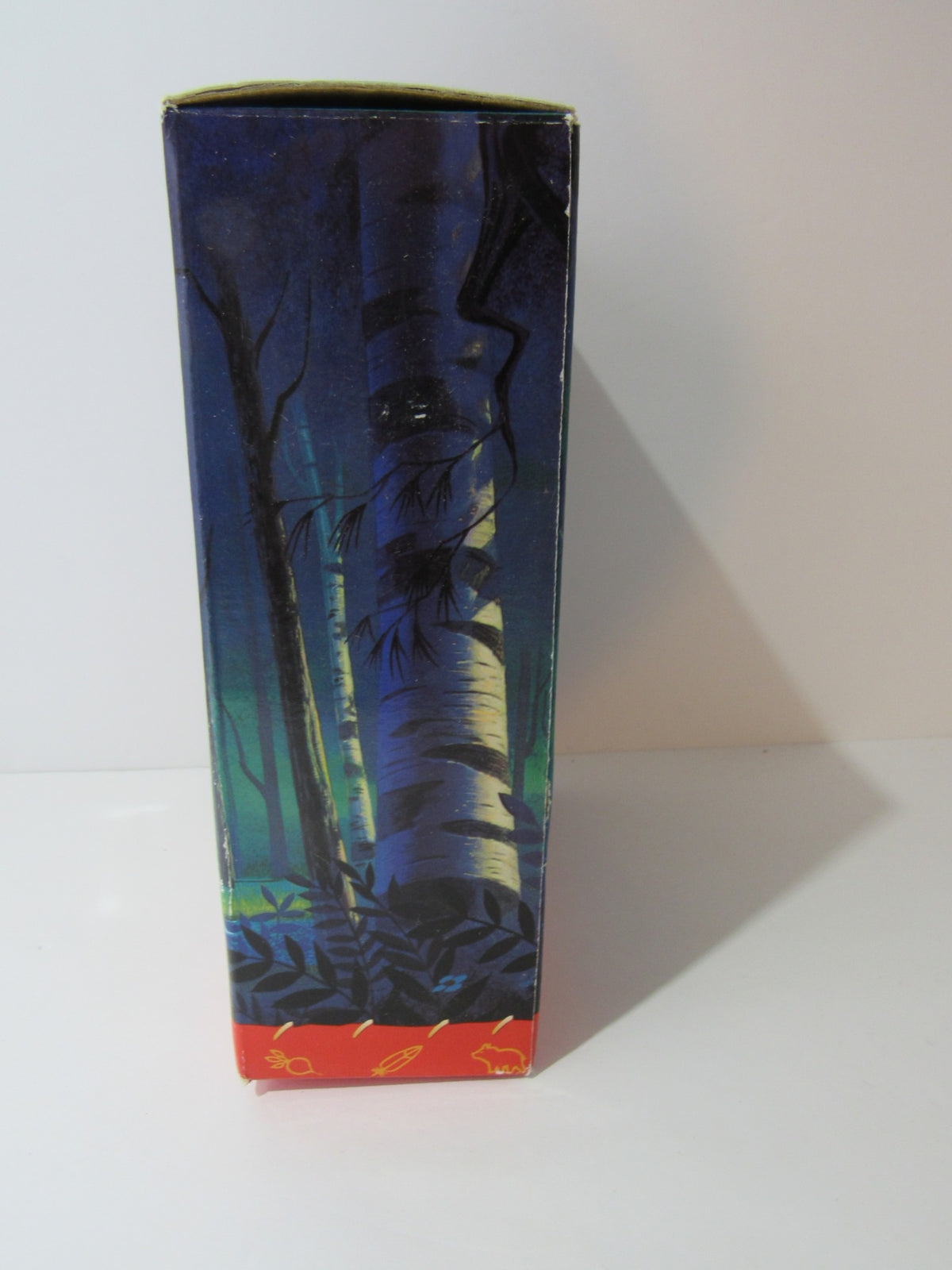Side view of the VTG Disney Pocahontas Twin Bell Alarm Clock in Original Box, showcasing the artistic design featured on the packaging.