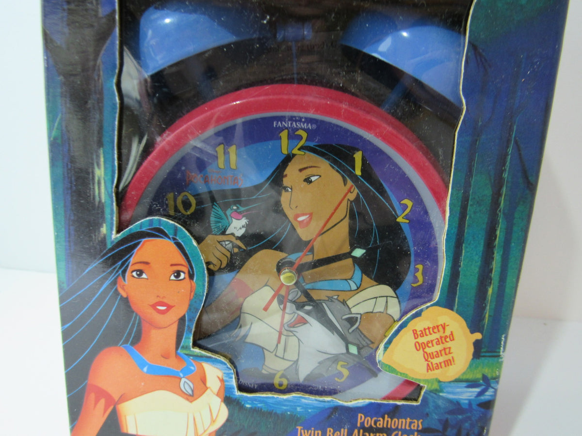 Front view of the VTG Disney Pocahontas Twin Bell Alarm Clock in Original Box, highlighting the clock's vibrant design and illustration of Pocahontas.