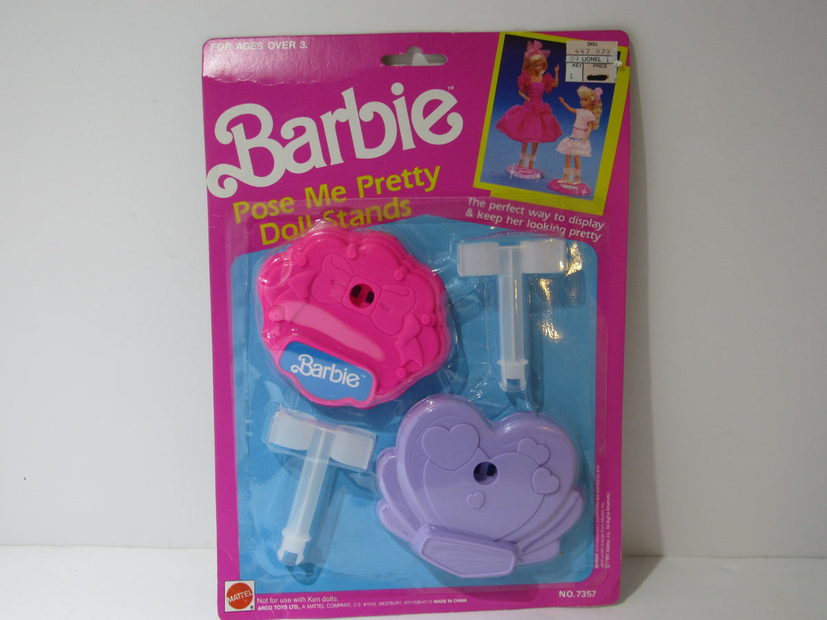 VTG Mattel BARBIE Pose Me Pretty Doll Stands package featuring pink and purple stands in original packaging, ideal for showcasing Barbie dolls.