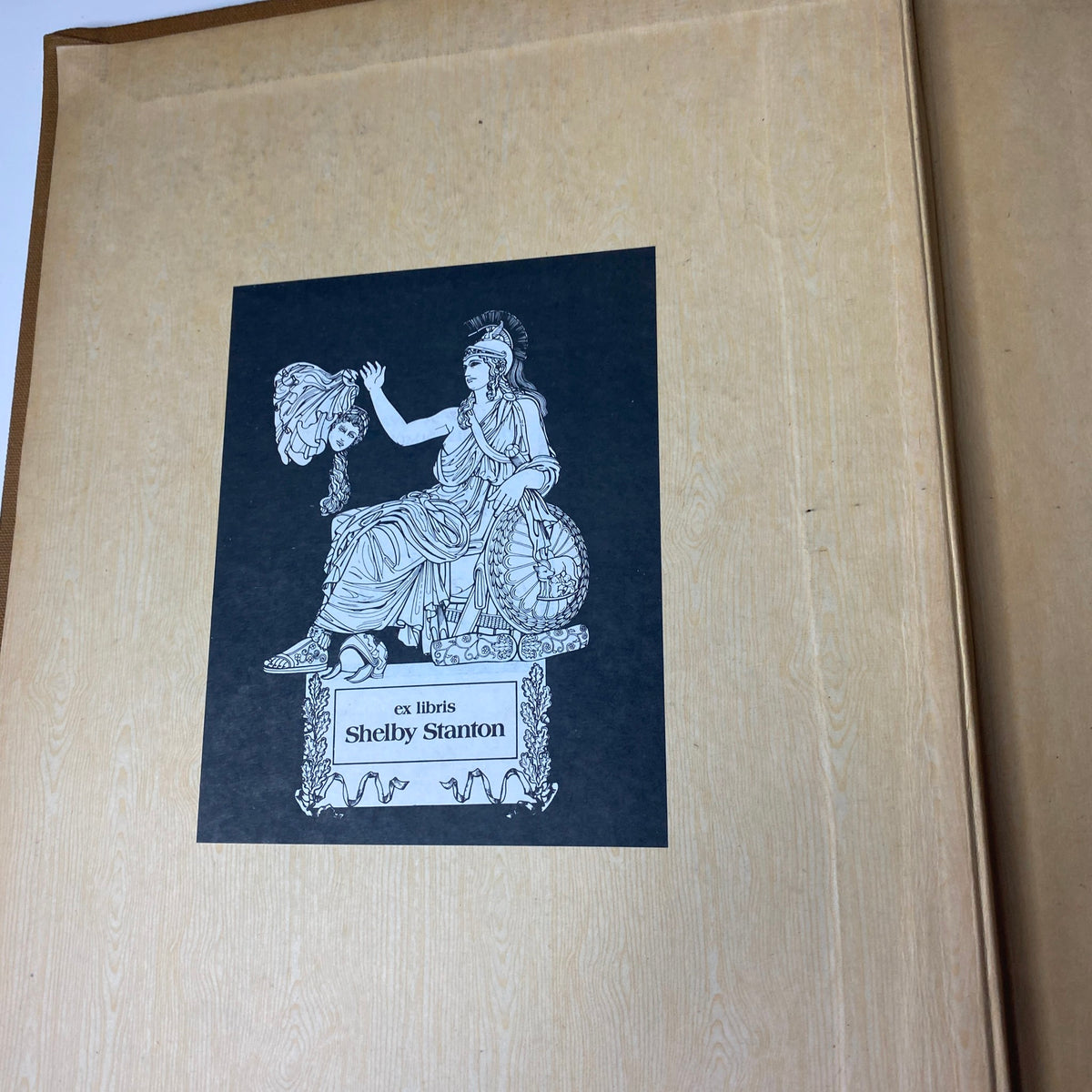 Ex libris bookplate featuring a seated figure in classical attire, included in the Ladies' Home Journal Bound Magazine 1944 July - December.