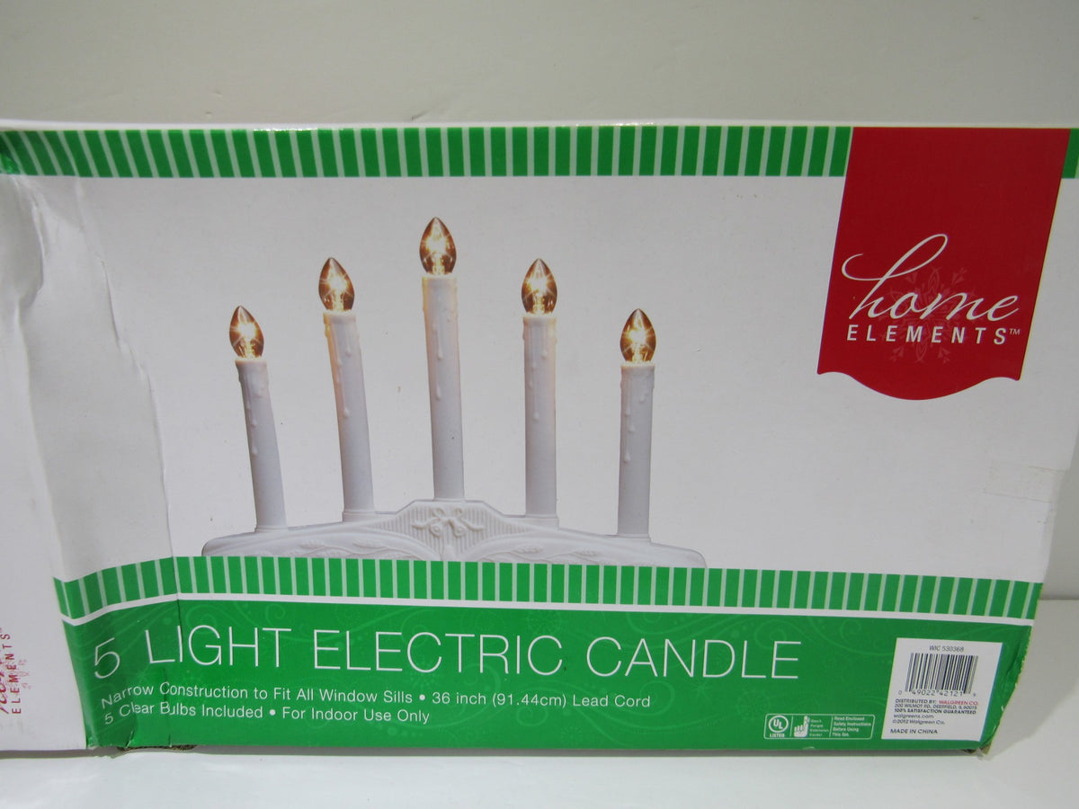 Home Elements Beacon 5 Light Electric Window Candolier in drip candle style, featuring five candle-like lights, perfect for window sills and indoor decoration.