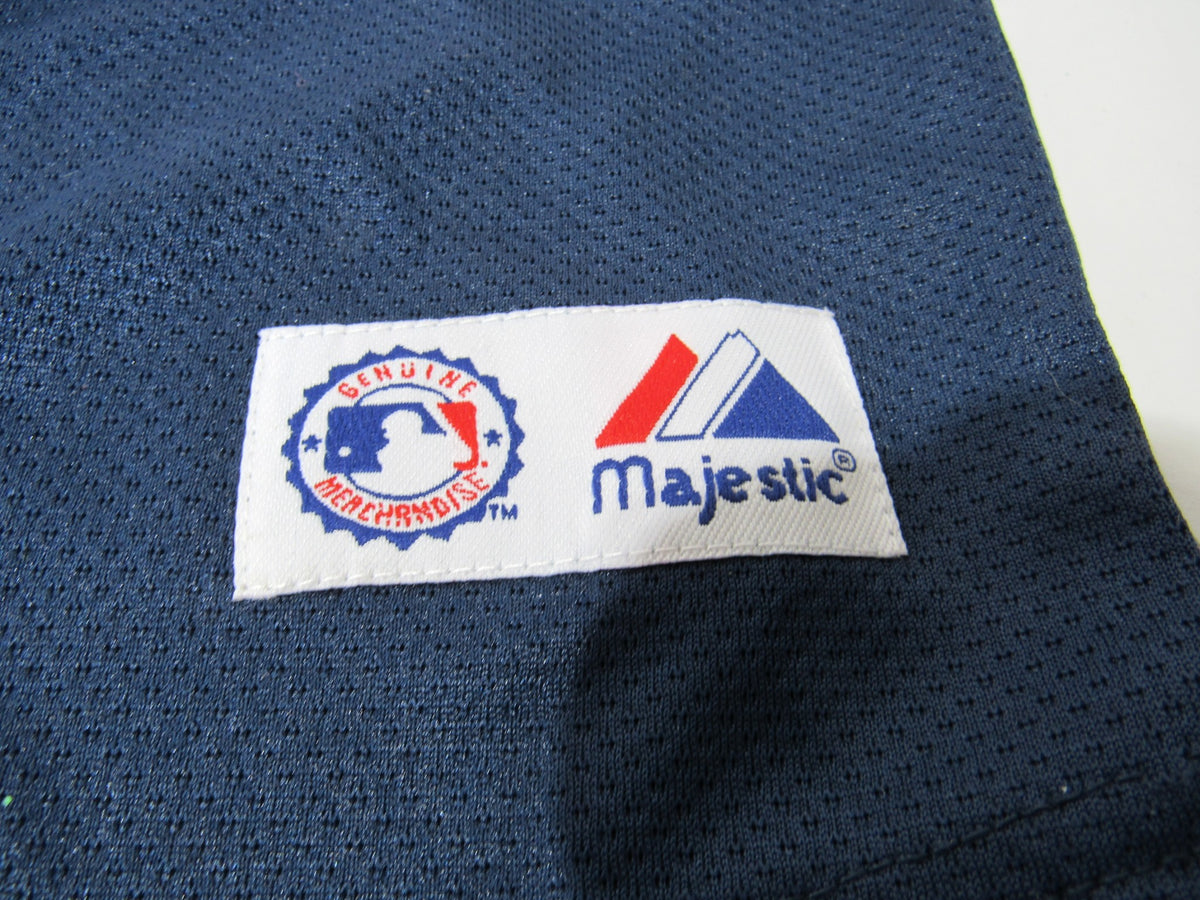 Navy Blue Majestic New York Yankees Kids Size 5/6 M Youth NWT - Close-up of the Majestic brand label on the jersey.