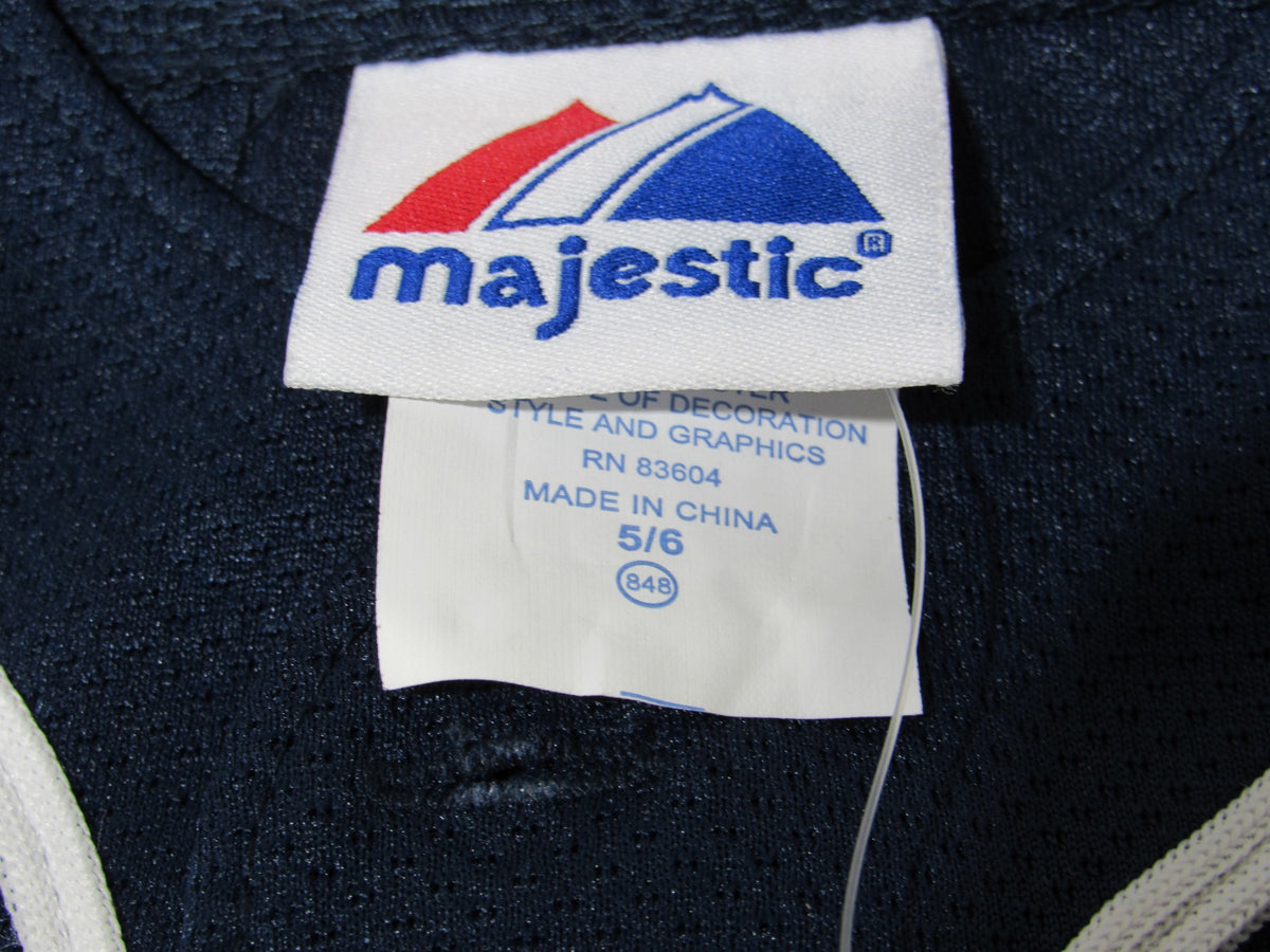 Navy Blue Majestic New York Yankees Kids Size 5/6 M Youth NWT - Tag showing size 5/6 and fabric details of the jersey.