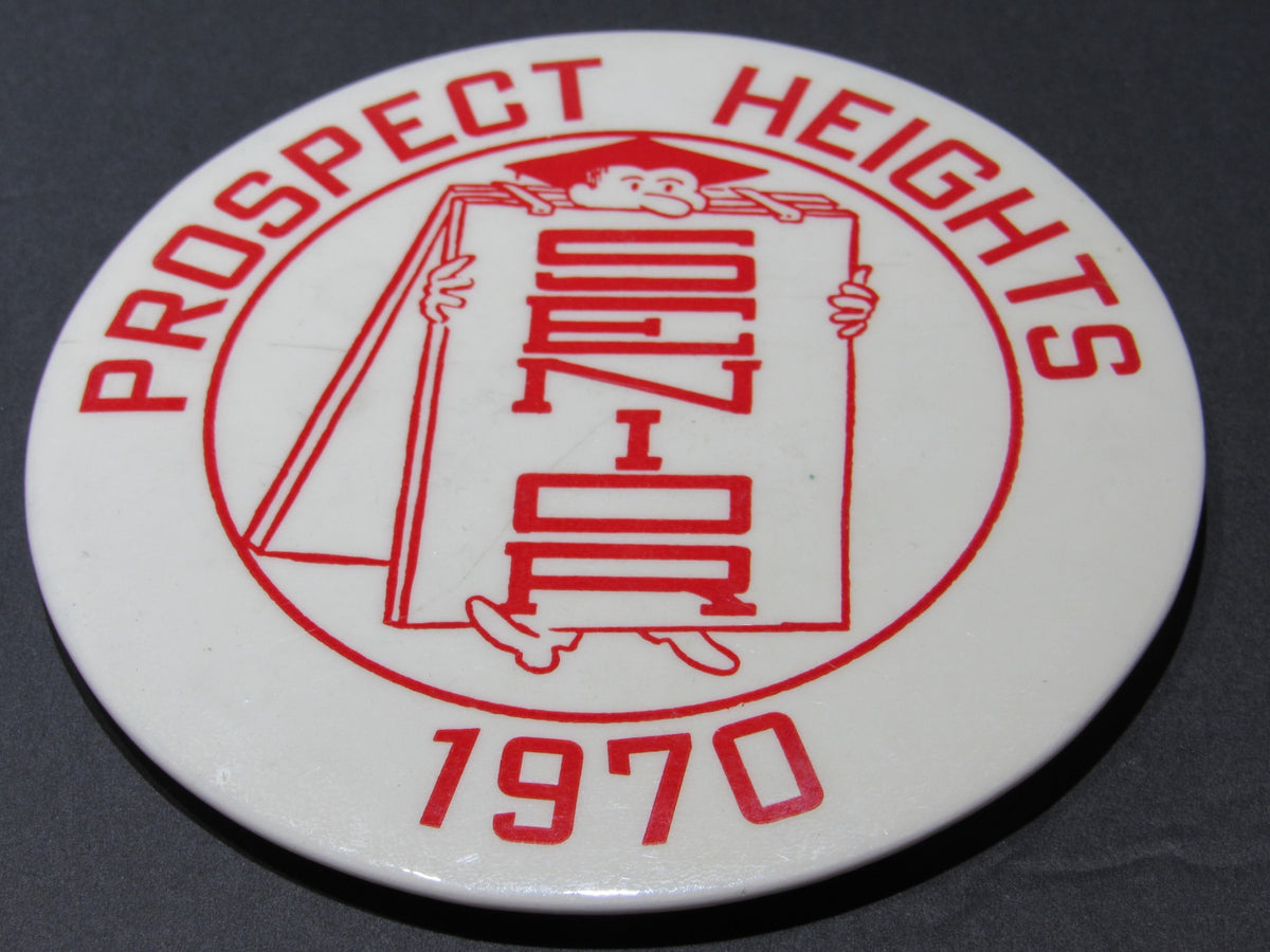 1970 Vintage Prospect Heights Senior High Button Pinback featuring the text 'PROSPECT HEIGHTS' and 'SENIOR 1970' with a cartoon character holding a sign.
