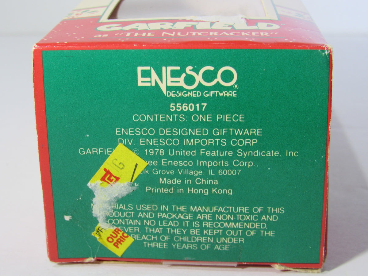 Product details of the 1978 VTG Enesco Treasury of Christmas Ornament starring Garfield as The Nutcracker, highlighting manufacturing information and item specifics.