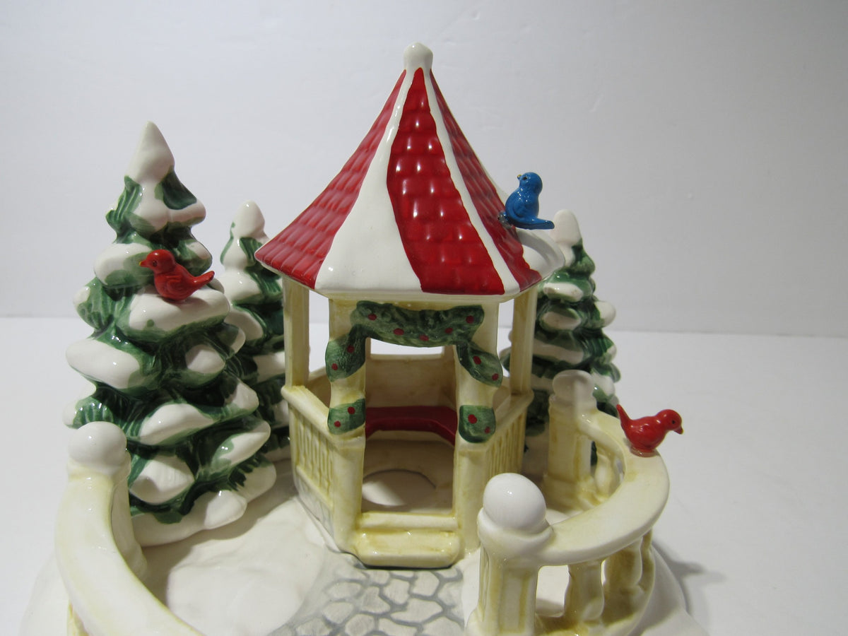 Close-up of 1989 Vintage Department 56 Snow Village Series Village Gazebo revealing the intricate design and vibrant colors.
