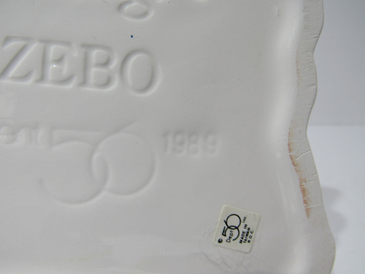 Bottom view of 1989 Vintage Department 56 Snow Village Series Village Gazebo displaying the manufacturer's marking and year.
