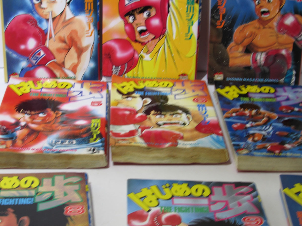 Close-up of Vintage 90s Hajime no Ippo manga comic covers, featuring action-packed illustrations of boxing scenes and character designs, capturing the essence of Ippo Makunouchi.