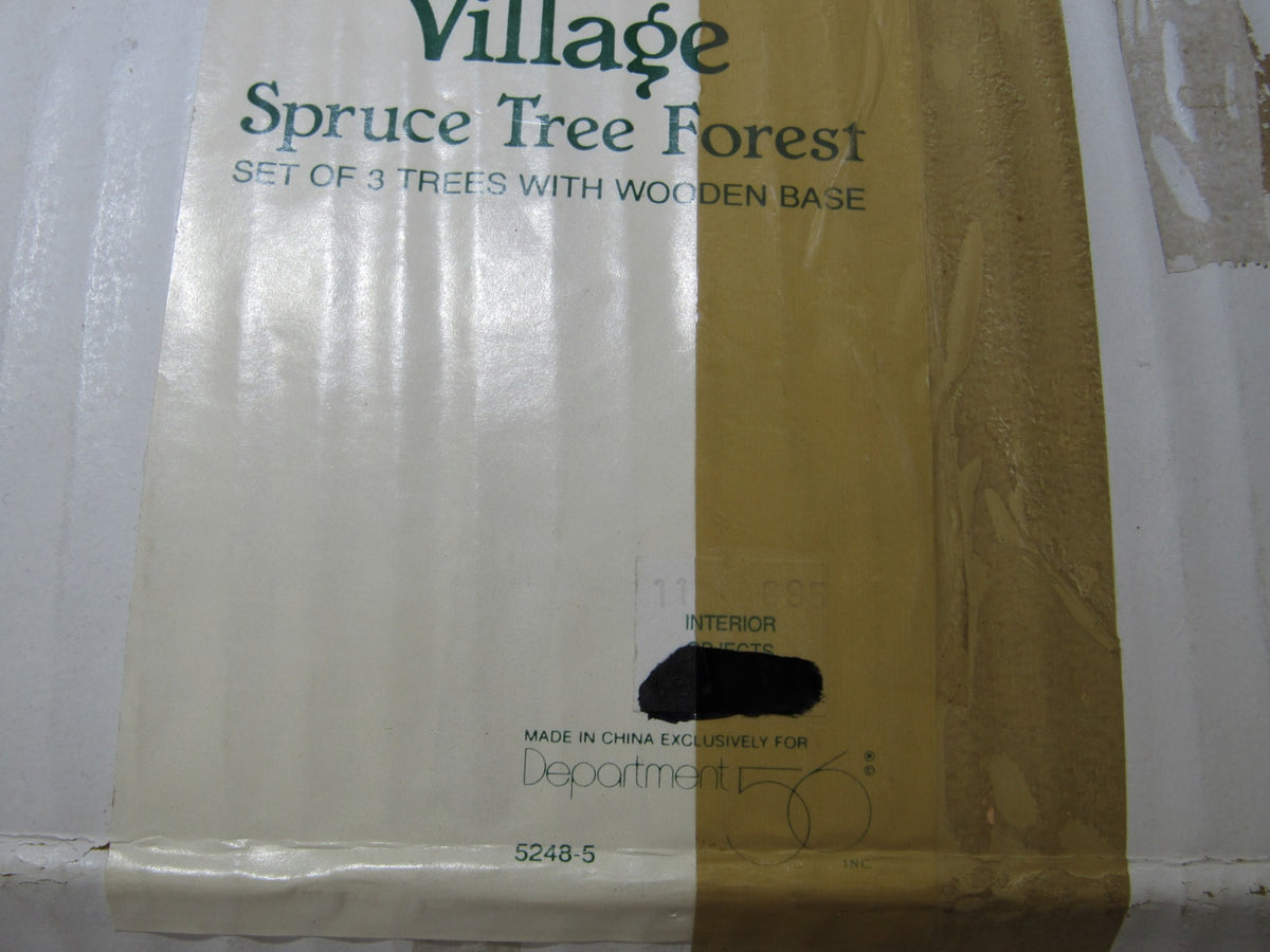 Label of the Department 56 Village Spruce Tree Forest with Wooden Base #5248-5 showing product information and packaging details.