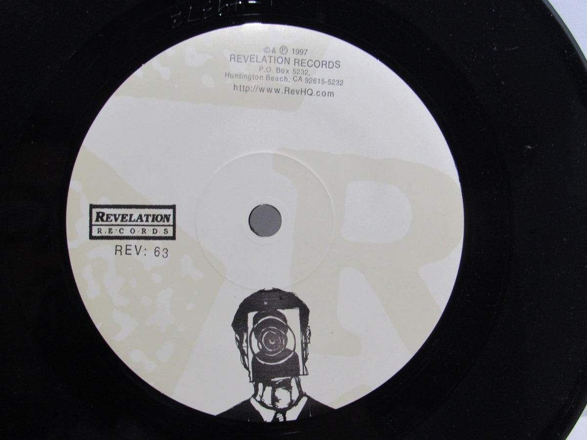 Another view of the vinyl record label for 'Kiss It Goodbye: Target Practice' on Revelation Records, highlighting the REV: 63 marking.